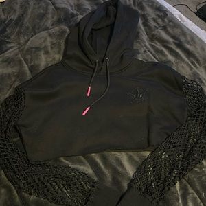 Jeffree Star cropped hooded sweatshirt with fishnet sleeves